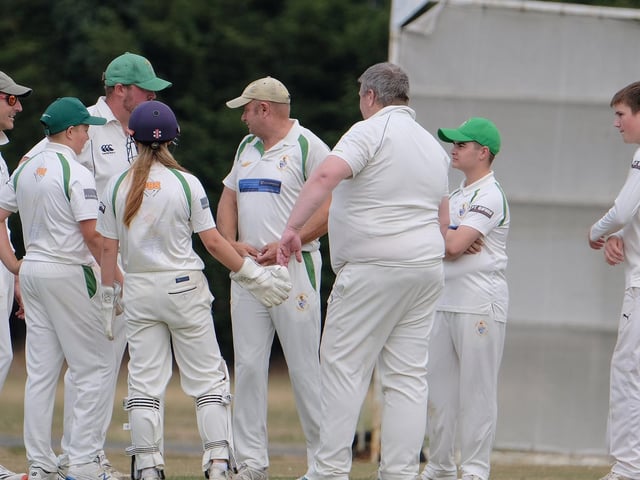 Bridlington 2nds celebrate the wicket of Harley Adams
