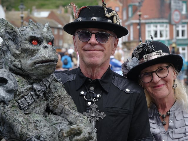 Visitors to Whitby pose for a picture.