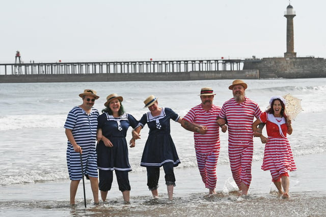 Mark Worley, Dawn Moss and Neil Perry (red stripes) and friends in the sea.