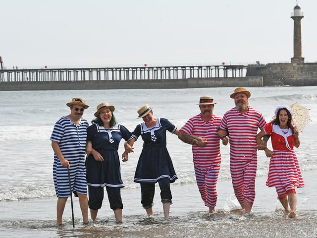Mark Worley, Dawn Moss and Neil Perry (red stripes) and friends in the sea.