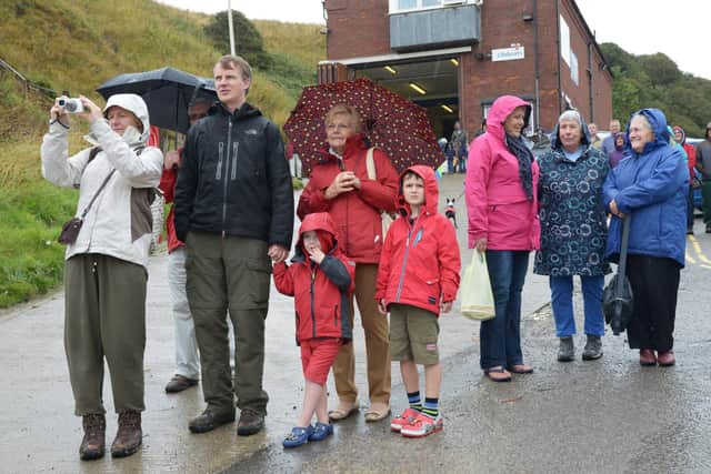 Flamborough Lifeboat August Bank Holiday Gala in 2015 – people still turn out in the rain to support the event. (pa1536-1f)