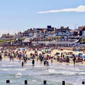 Aled Jones sent in this great photograph of visitors on the beach enjoying the scorching weather.
