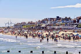 Aled Jones sent in this great photograph of visitors on the beach enjoying the scorching weather.