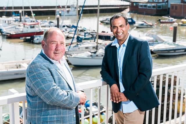 Michael Harrison, founder and owner of Harrison Leisure, (left) is pictured with Dillon Ariyaratne. Image: Kevin Michael Ladden Photography