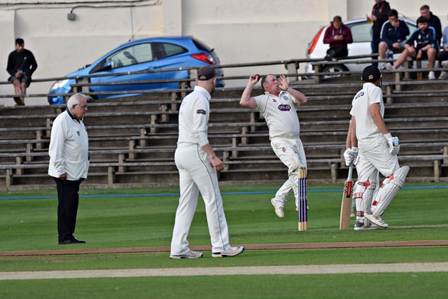Pickering's Dave Greenlay bowling from the Peasholm Park End