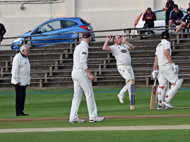 Pickering's Dave Greenlay bowling from the Peasholm Park End
