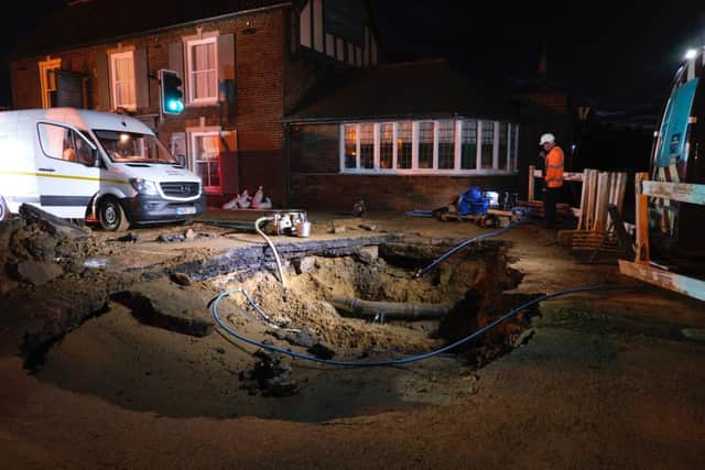 The large hole appeared in the middle of the road, forcing it to be closed. (Photo: John Carlisle)