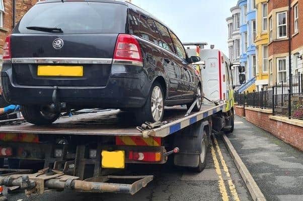 The car was seized on Marlborough Street in Scarborough.