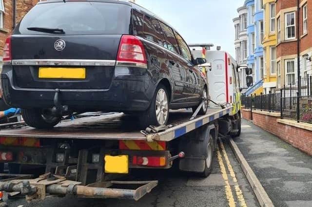 The car was seized on Marlborough Street in Scarborough.