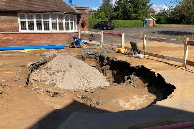 The sinkhole emerged in the middle of road, forcing police to close the A64.