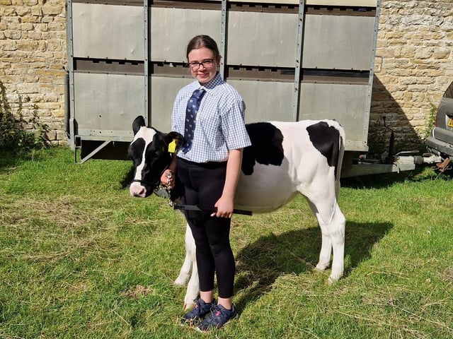 Chloe Wright from Lealholm with her calf Guess