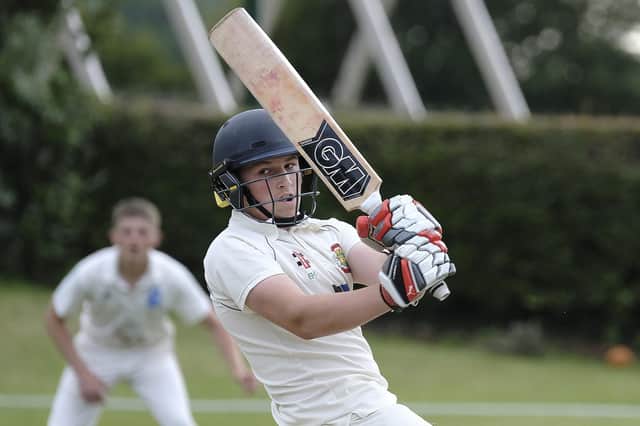 Elliot Hatton's ton and five-wicket haul helped Flixton to 265-run home win against Cottingham