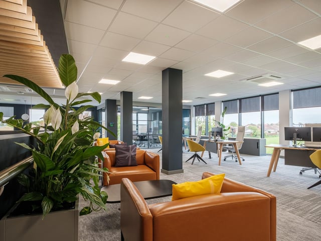 A variety of seating has been built in so employees can switch up their working styles.