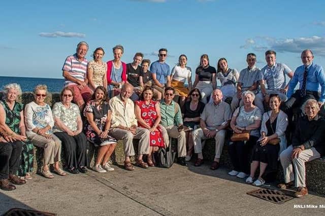 The family of Carole Priestley are pictured on Bridlington North Pier ahead of the sail past by Bridlington's all-weather lifeboat ‘Antony Patrick Jones’. Photo: Mike Milner RNLI