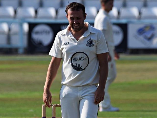 Scarborough bowler Dan Robson bagged remarkable figures of 5-9