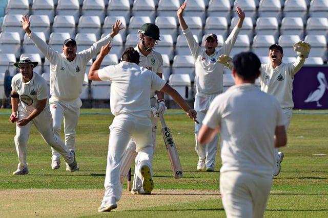 Scarborough paceman Dan Robson celebrates one of his five wickets in the thumping home win against Sessay on Saturday