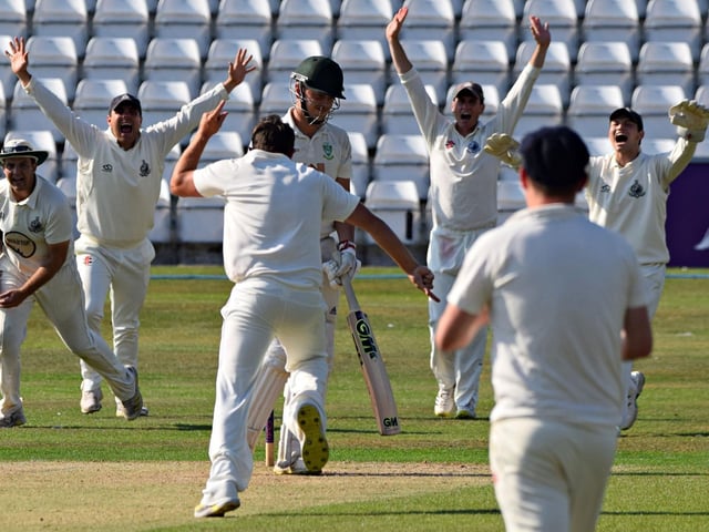 Scarborough paceman Dan Robson celebrates one of his five wickets in the thumping home win against Sessay on Saturday