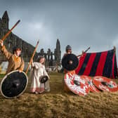 Young Viking warriors Elijah Harris, 8, Keira Harris, 5, and Trystan Harris, 11, from Northampton