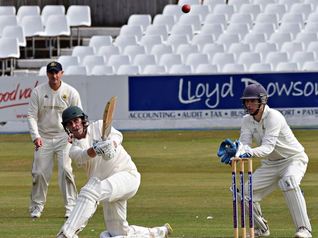 Scarborough batter Pat Roberts smacks a huge six