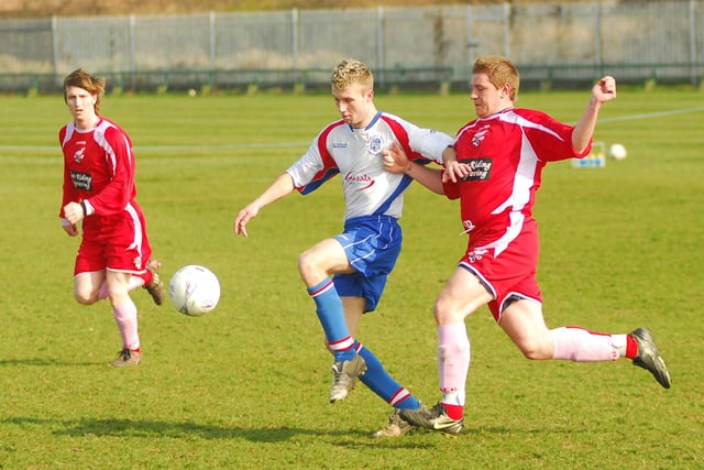 Do you recognise any footballers in this photo?