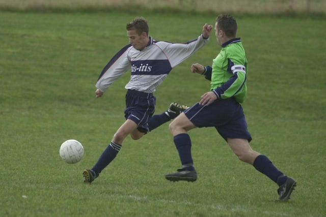 Do you recognise any footballers in this photo?