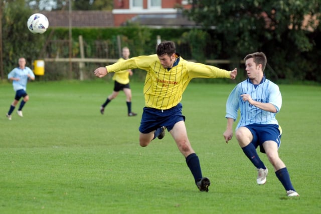 Do you recognise any footballers in this photo?
