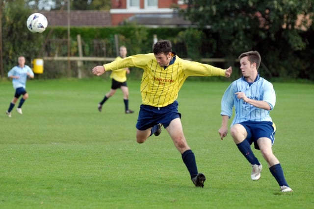 Do you recognise any footballers in this photo?