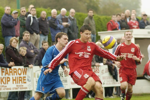 Do you recognise any footballers in this photo?