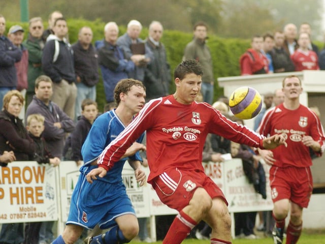Do you recognise any footballers in this photo?