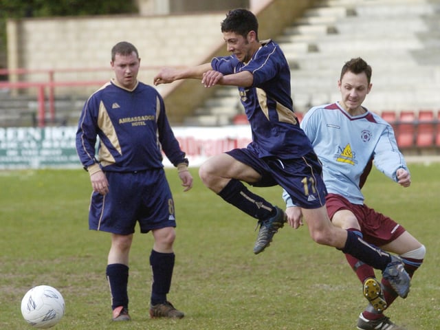Do you recognise any footballers in this photo?