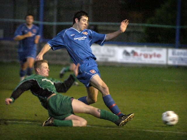 Do you recognise any footballers in this photo?
