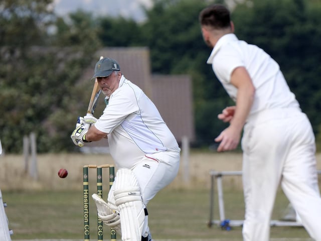 Heslerton batter Tony Watson winds up for a big shot