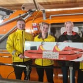 Lesley Gafney, landlady of the Beaconsfield pub, brought a welcome donation to Bridlington RNLI. Photo courtesy of Bridlington RNLI