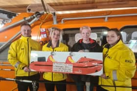 Lesley Gafney, landlady of the Beaconsfield pub, brought a welcome donation to Bridlington RNLI. Photo courtesy of Bridlington RNLI