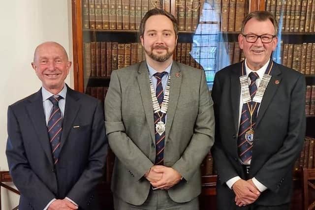 Retiring branch chairman Mike Davies, new chairman Luke Moreland, and club president Jim Ezard. Photo submitted