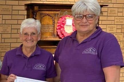 Flamborough Village Hall treasurer Linda James and secretary Audrey Heywood collected the award. Photo submitted