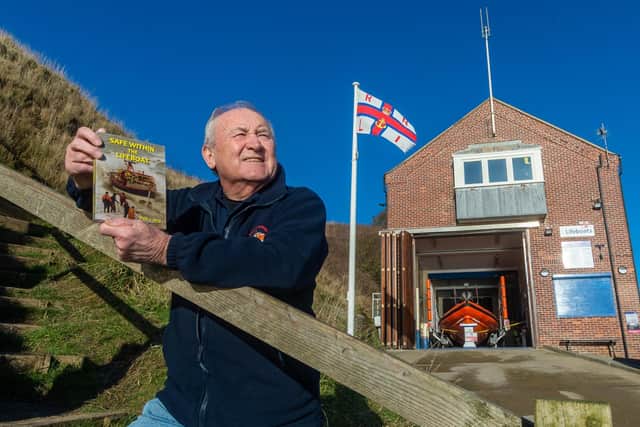 Author Paul L Arro is pictured with his latest book ‘Safe Within The Lifeboat’.