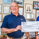 Author Paul L Arro presented a cheque for £1,000 to Capt David Freeman, the site’s lifeboat operation manager, with the proceeds coming from his latest book ‘Safe Within The Lifeboat’.