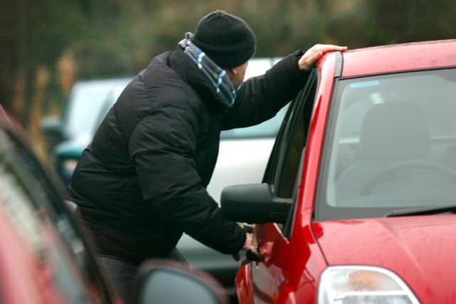 Four cars were stolen from by simply opening the unlocked doors. Stock image.