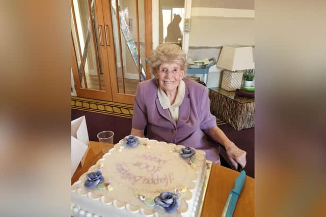 Peggy Lambert with her 100th birthday cake