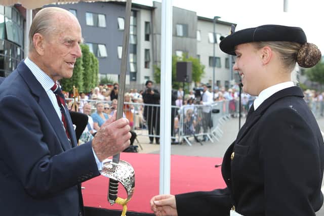 Alexandra Ward, from Filey, being presented with Welbeck Defence Sixth Form College’s Sword of Honour by Prince Philip.