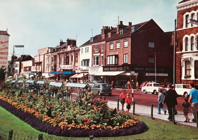 This old photograph shows the Grand Pavilion Theatre gardens in all their glory.