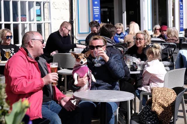 Customers enjoy a pint in the sunshine at The King Richard III.