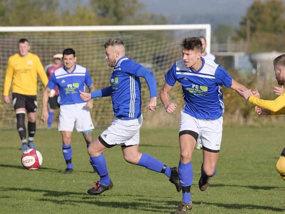Trafalgar (blue kit) and holders Newlands are in quarter-final action on Sunday morning