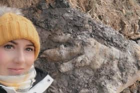 Marie pictured beside her find.