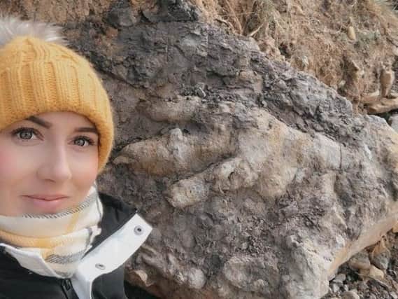 Marie pictured beside her find.
