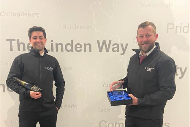 Company health and safety award winners Terry Palmer and Gary Barker with their trophy.