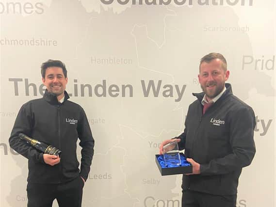 Company health and safety award winners Terry Palmer and Gary Barker with their trophy.