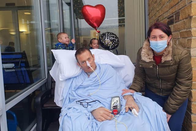 Laura, Ollie and Oscar on the only visit the children have been able to make to see their dad Andy.