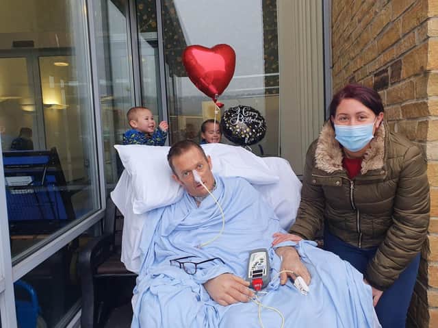 Laura, Ollie and Oscar on the only visit the children have been able to make to see their dad Andy.